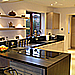 high gloss slab kitchen